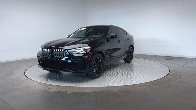 used 2023 BMW X6 car, priced at $60,771