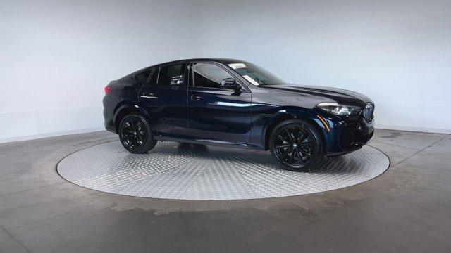 used 2023 BMW X6 car, priced at $60,771