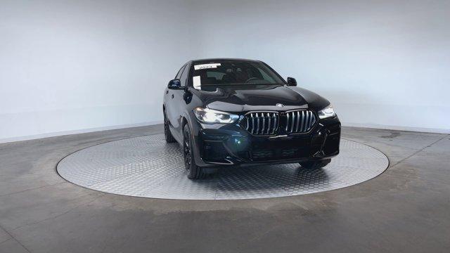 used 2023 BMW X6 car, priced at $60,771