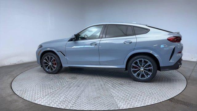 new 2025 BMW X6 car, priced at $82,425