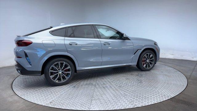 new 2025 BMW X6 car, priced at $82,425