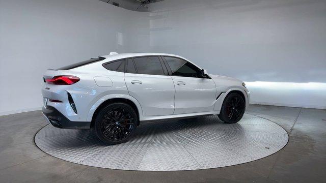 used 2023 BMW X6 car, priced at $73,926