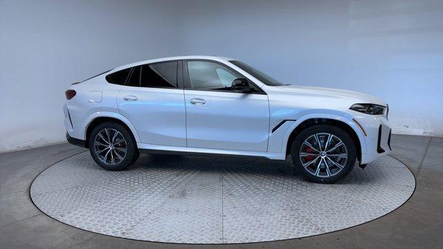 new 2025 BMW X6 car, priced at $107,885