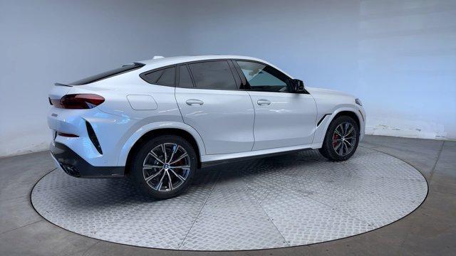 new 2025 BMW X6 car, priced at $107,885