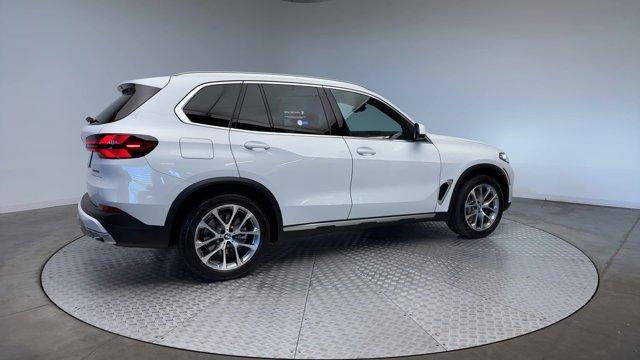 used 2025 BMW X5 car, priced at $66,347