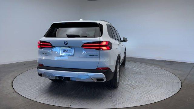 used 2025 BMW X5 car, priced at $66,347