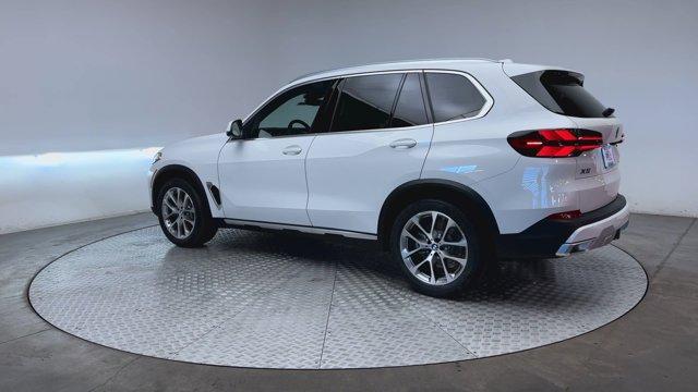 used 2025 BMW X5 car, priced at $66,347