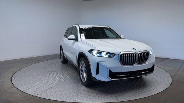used 2025 BMW X5 car, priced at $66,347