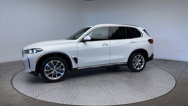 used 2025 BMW X5 car, priced at $66,347