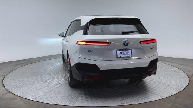 new 2024 BMW iX car, priced at $84,695