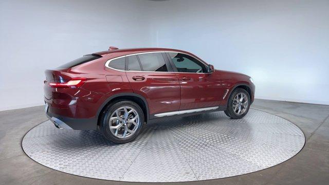 used 2023 BMW X4 car, priced at $45,688
