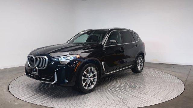 used 2025 BMW X5 PHEV car, priced at $67,125