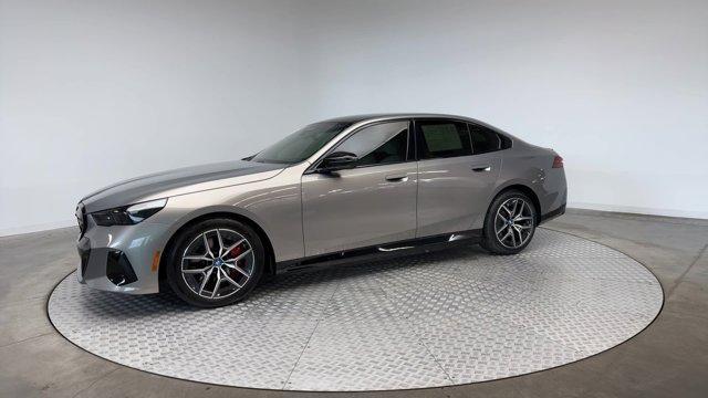 used 2024 BMW i5 car, priced at $66,896