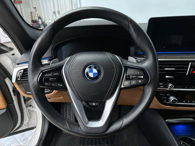 used 2023 BMW 530e car, priced at $37,571