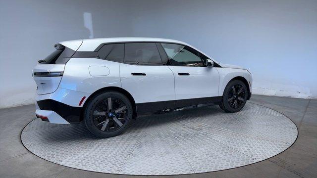 new 2025 BMW iX car, priced at $104,080