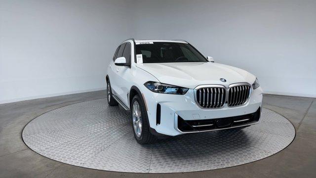 used 2025 BMW X5 PHEV car, priced at $78,671