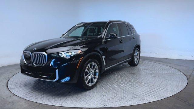 used 2024 BMW X5 car, priced at $63,777