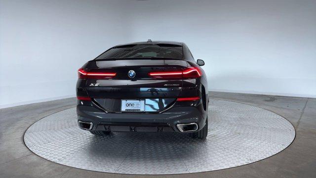 used 2025 BMW X6 car, priced at $75,971
