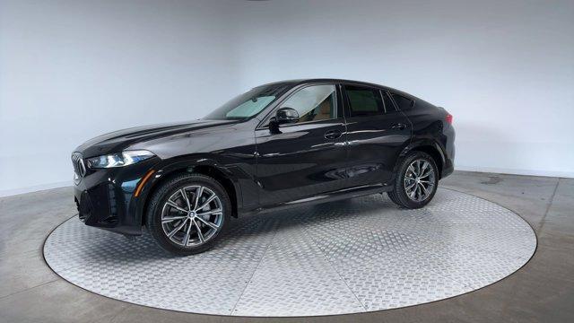 used 2025 BMW X6 car, priced at $75,971