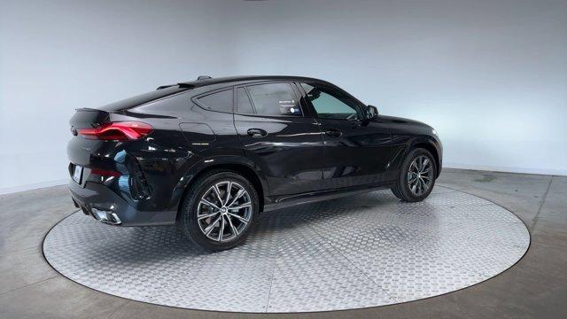 used 2025 BMW X6 car, priced at $75,971