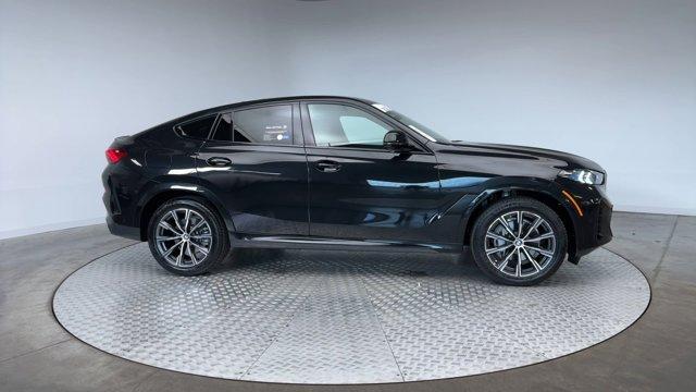 used 2025 BMW X6 car, priced at $75,971