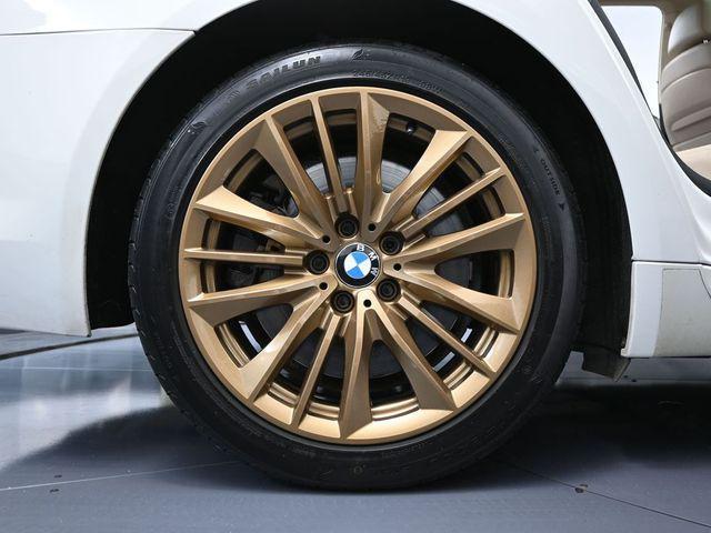 used 2012 BMW 750 car, priced at $9,499