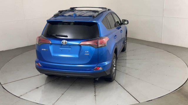 used 2018 Toyota RAV4 car, priced at $17,799