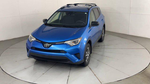 used 2018 Toyota RAV4 car, priced at $17,799