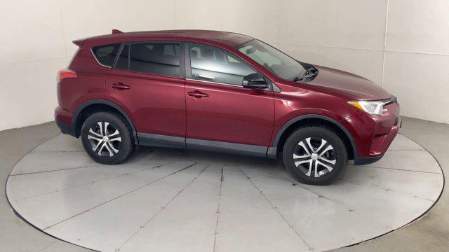 used 2018 Toyota RAV4 car, priced at $19,299