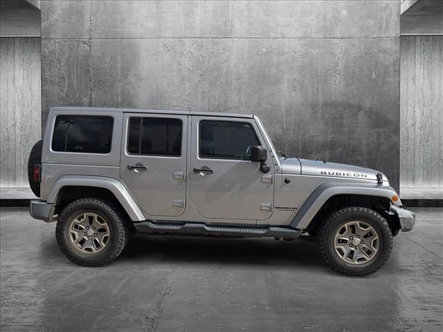 used 2017 Jeep Wrangler Unlimited car, priced at $24,446