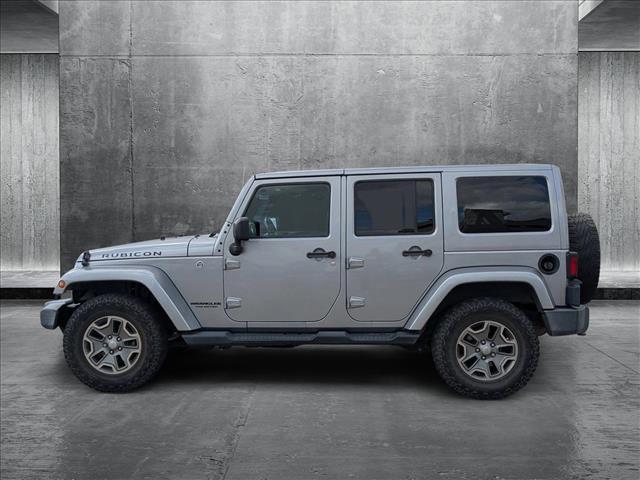 used 2017 Jeep Wrangler Unlimited car, priced at $24,446