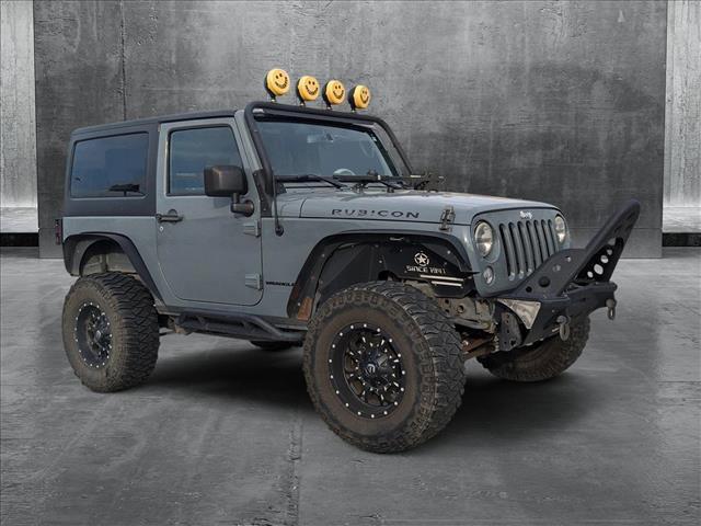 used 2014 Jeep Wrangler car, priced at $18,993