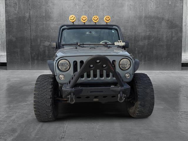 used 2014 Jeep Wrangler car, priced at $18,993