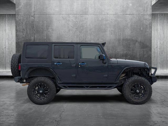 used 2016 Jeep Wrangler Unlimited car, priced at $20,492