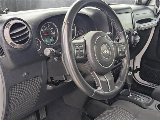 used 2012 Jeep Wrangler Unlimited car, priced at $15,995