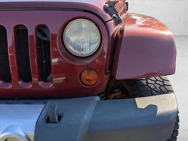 used 2010 Jeep Wrangler Unlimited car, priced at $10,995