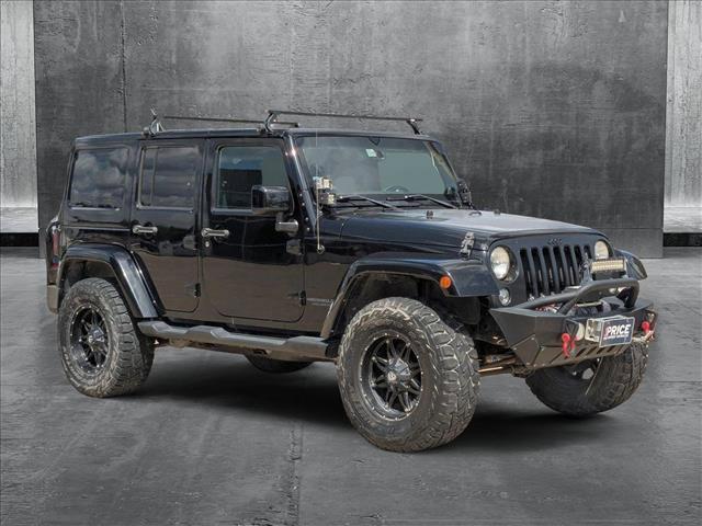 used 2014 Jeep Wrangler Unlimited car, priced at $18,841