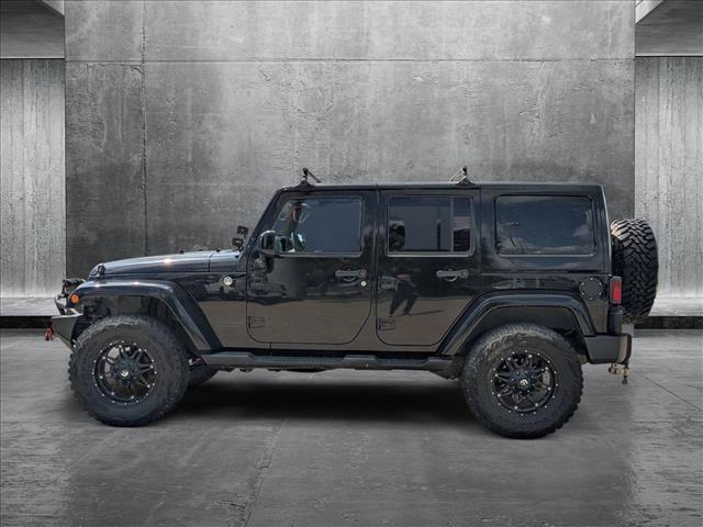 used 2014 Jeep Wrangler Unlimited car, priced at $18,841