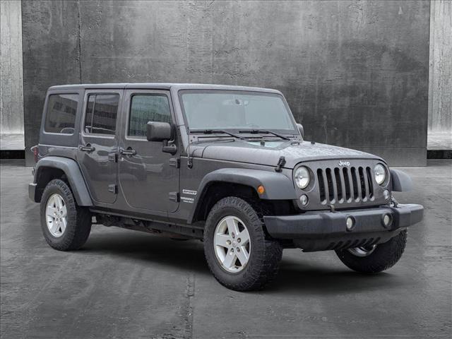 used 2017 Jeep Wrangler Unlimited car, priced at $19,892