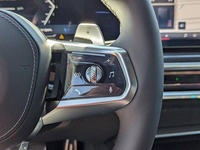 new 2025 BMW 740 car, priced at $110,875
