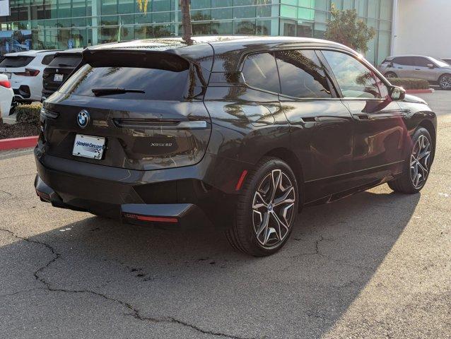 used 2025 BMW iX car, priced at $84,595