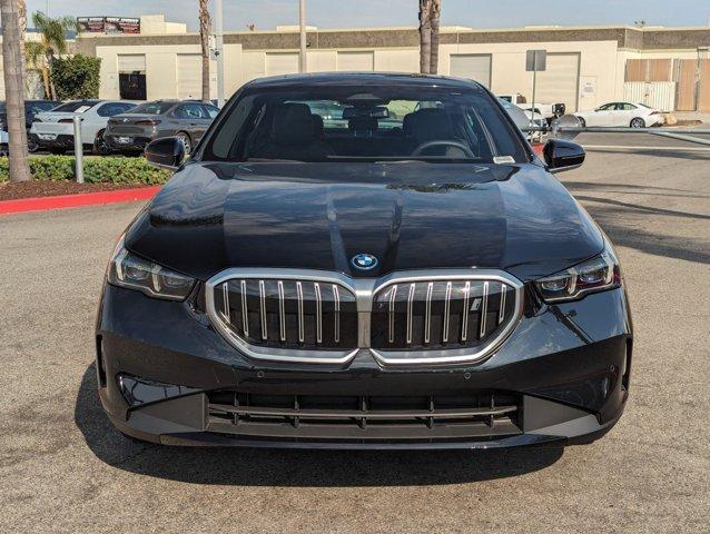 used 2024 BMW i5 car, priced at $59,295