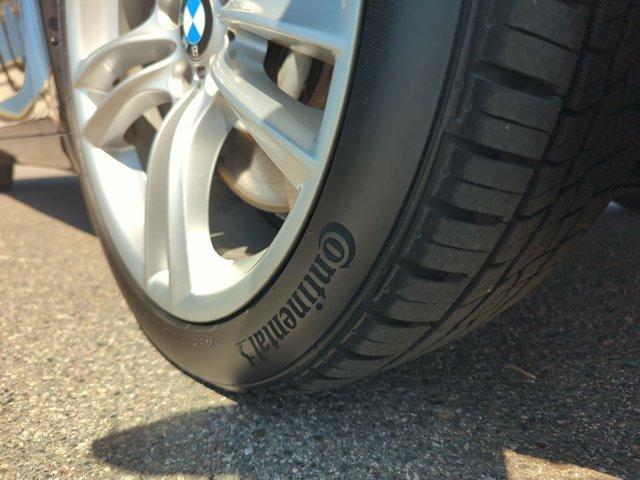 used 2015 BMW 750 car, priced at $16,990