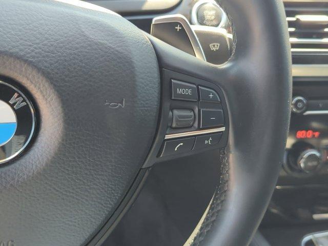used 2015 BMW 750 car, priced at $19,272