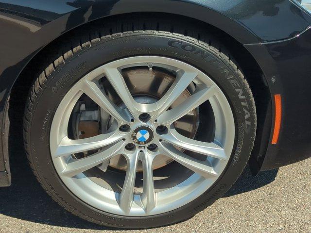 used 2015 BMW 750 car, priced at $19,272