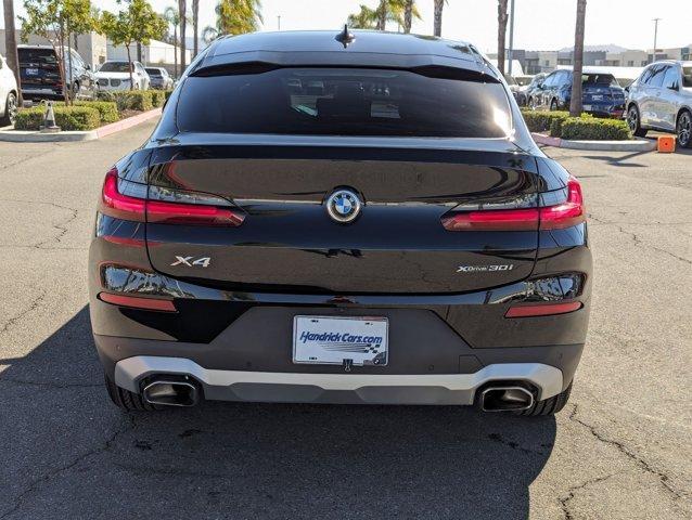 used 2022 BMW X4 car, priced at $37,499