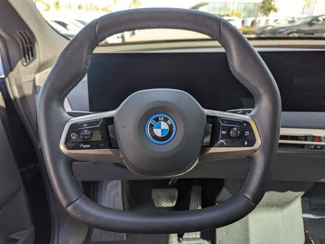 used 2024 BMW iX car, priced at $63,595