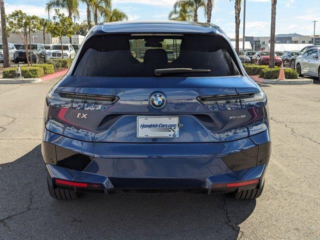 used 2024 BMW iX car, priced at $63,595