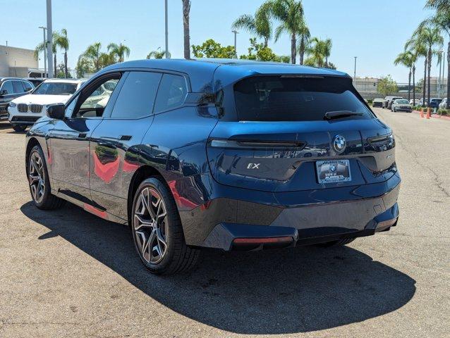 new 2025 BMW iX car, priced at $100,325