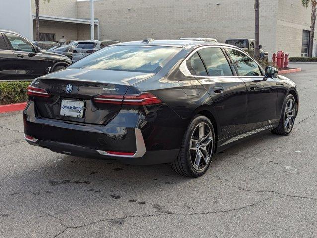 used 2024 BMW i5 car, priced at $65,295